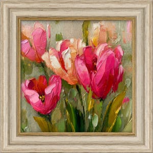 May include: An oil painting of vibrant pink and peach tulips with thick, textured brushstrokes. The flowers are set against a soft, muted green background, all encased in a decorative, light-colored wooden frame with a subtle gold inner trim.
