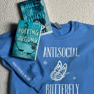 Antisocial butterfly with sleeve design | sweater | bookish merch | bookaholic | reader | books | bookadict