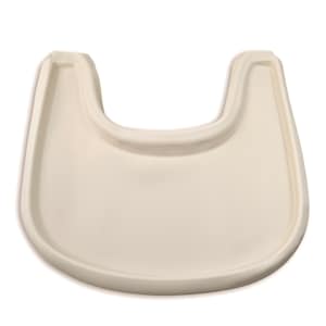 A high chair with a cream full cover silicone place mat on the attached tray.