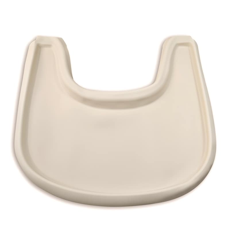 A high chair with a cream full cover silicone place mat on the attached tray.