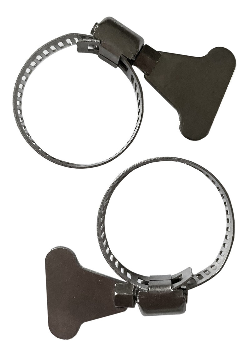 Metal support clips that hold the wooden footrest in place on the high chair legs.