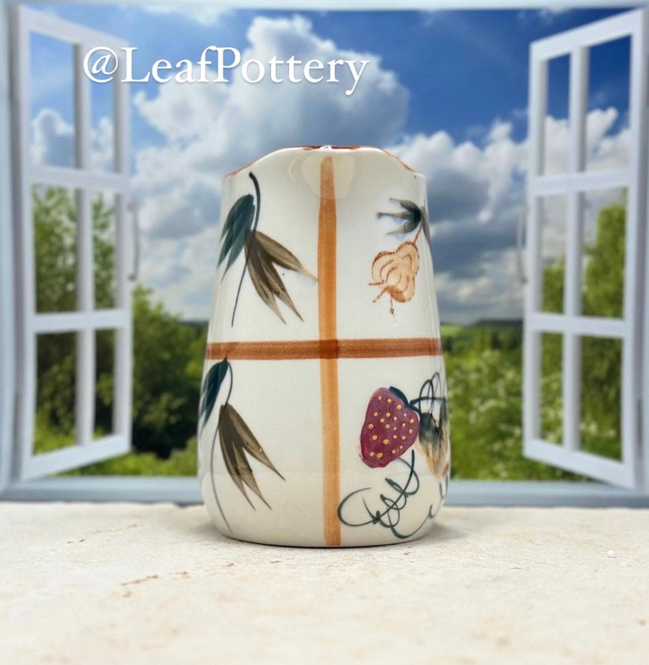 ヴィンテージの芸術的な陶器のピッチャー、マルチカラーの花柄デザイン