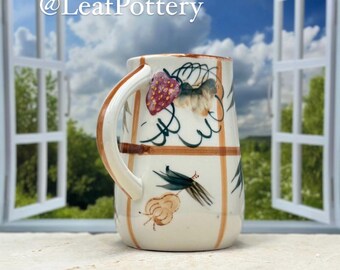 ヴィンテージの芸術的な陶器のピッチャー、マルチカラーの花柄デザイン