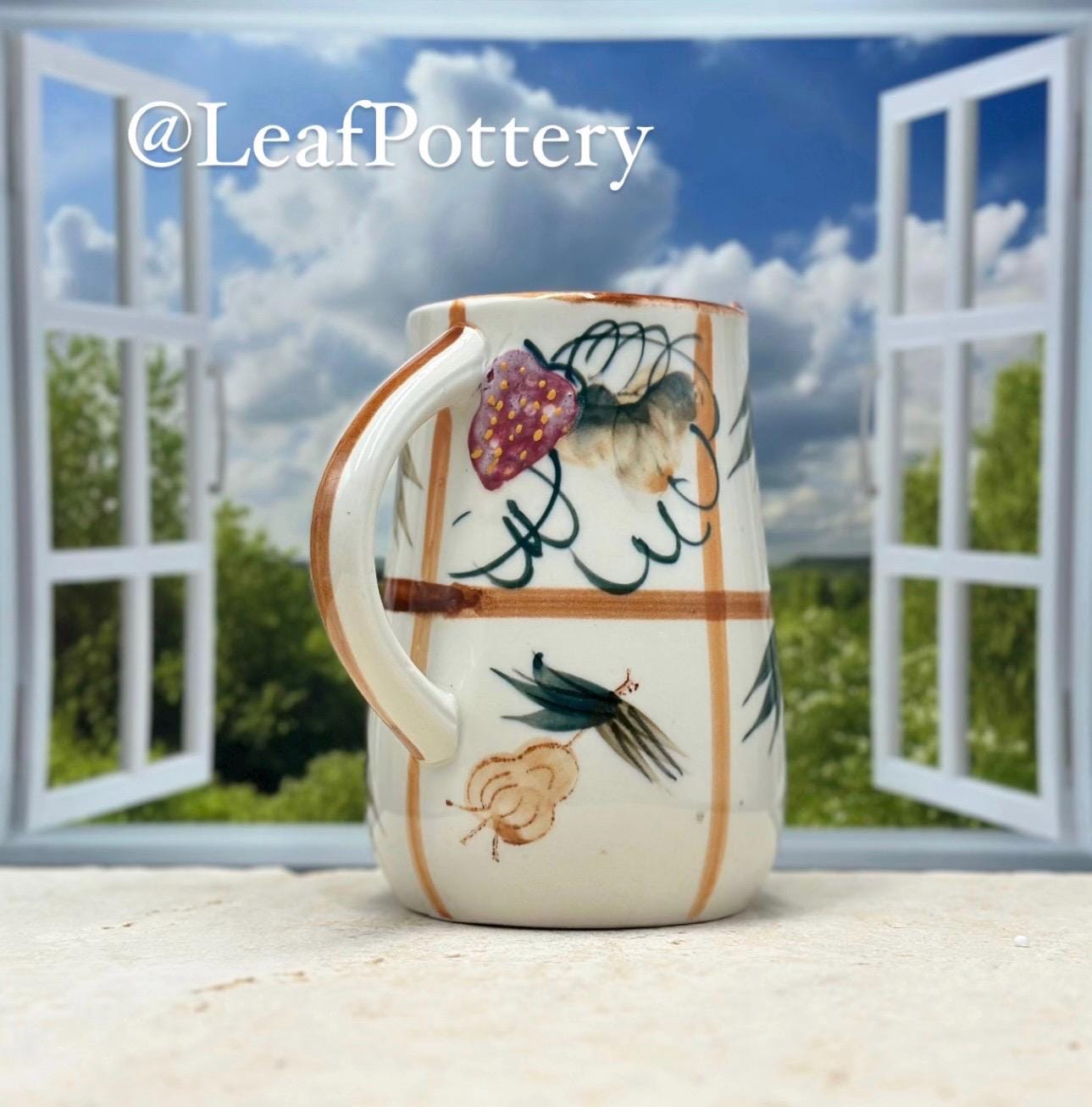 ヴィンテージの芸術的な陶器のピッチャー、マルチカラーの花柄デザイン