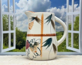 ヴィンテージの芸術的な陶器のピッチャー、マルチカラーの花柄デザイン