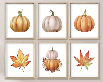 May include: Set of six printable fall-themed illustrations featuring pumpkins and autumn leaves. The illustrations are in watercolor style with a white background.