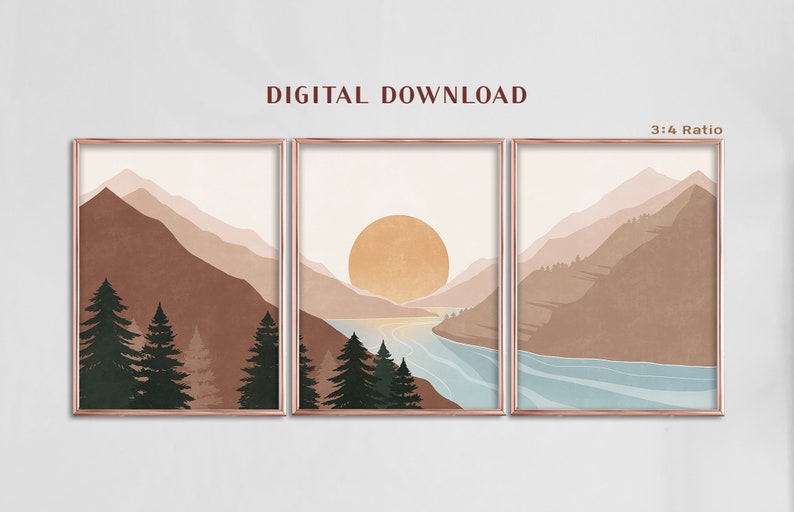 K&ouml;nnte beinhalten: Ein Set aus drei digitalen Drucken, die eine minimalistische Landschaft mit Bergen, einem See und einer gro&szlig;en Sonne zeigen. Die Drucke haben ein Verh&auml;ltnis von 3:4 und eine ged&auml;mpfte Farbpalette in Braun-, Rosa- und Blaut&ouml;nen.