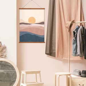 May include: A framed wall art print with a minimalist landscape design. The artwork features a warm color palette with a large yellow sun, layered hills in shades of brown, pink, and blue. The text "DIGITAL DOWNLOAD" is in the upper right corner.