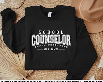 May include: A black sweatshirt with the words "SCHOOL COUNSELOR" in white block letters. Below the text is "CUSTOM SCHOOL NAME" and "MRS. JAMES". The sweatshirt is a digital product.