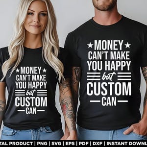 May include: Black t-shirts with the text "MONEY CAN'T MAKE YOU HAPPY but CUSTOM CAN" in white. The text includes star symbols and horizontal lines. The shirts are worn by two people.