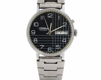 Vintage Soviet Slava mechanical wristwatch with black geometric dial, day/date calendar and 26-jewel movement