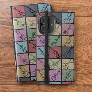 May include: A phone case and a folio case with a colorful violin pattern. The cases feature a grid of squares in various pastel colors, each containing a black outline drawing of a violin. The cases are on a wooden surface.
