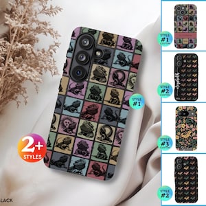 May include: A black smartphone case featuring a grid pattern of bearded dragons in various poses, interspersed with sun icons in muted tones of pink, blue, green, and yellow. The case has a camera cutout and displays the text Galaxy S26 | Black.