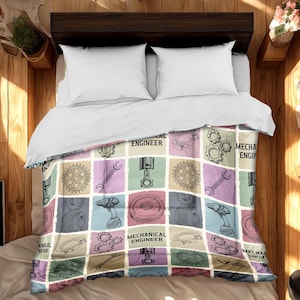 May include: A bed with white pillows and a duvet cover featuring a patchwork design. The patchwork includes images of gears, wrenches, and pistons, with the words "MECHANICAL ENGINEER" printed on the squares. The color palette includes pastel shades.