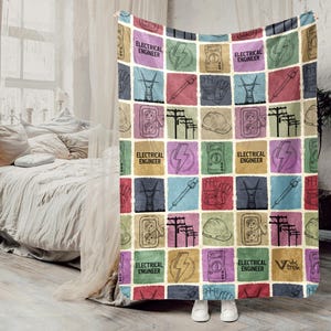 May include: A colorful throw blanket featuring a patchwork design with electrical engineering-themed illustrations. The squares include images of lightning bolts, electrical outlets, and the text "ELECTRICAL ENGINEER". The blanket is draped over a bed.