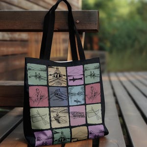 May include: Black tote bag featuring a grid of colorful squares with illustrations of people rowing boats. The illustrations are in a sketch style, with a variety of scenes including rowers on lakes and rivers. The bag has black handles.