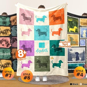 May include: A cream-colored throw blanket featuring a grid of twelve squares, each displaying a silhouette of a dachshund in various colors. The center square includes the letter E and the name elizabeth in teal script text.