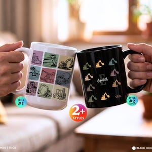 Peut inclure: Un mug blanc de 425 ml avec une grille de neuf illustrations de véhicules de chantier et un mug noir de 310 ml avec un motif répétitif de petites pelles, une grande lettre E et le prénom Elizabeth écrit en lettres blanches cursives.
