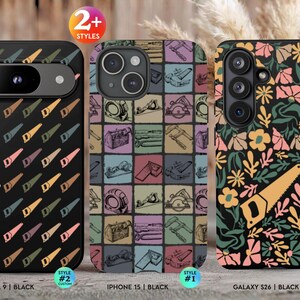 May include: Three black smartphone cases. The left case features a repeating saw pattern and the name Elizabeth. The center case displays a grid of various hand tools. The right case shows a floral pattern with a single saw graphic.