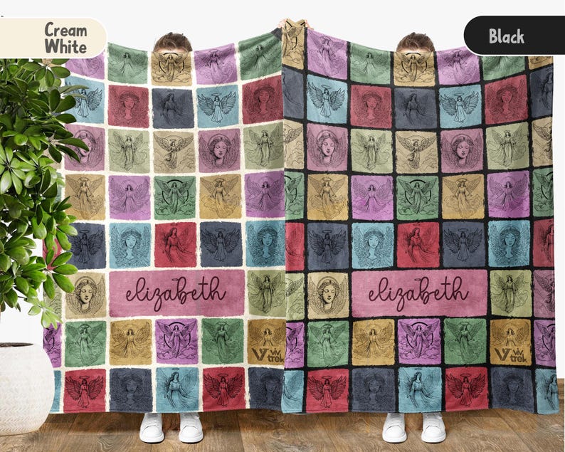 May include: Two rectangular blankets featuring a grid of squares with angel illustrations in various colors. One blanket has a cream white background, the other black. Both display the name elizabeth in a central rectangular panel in script font.