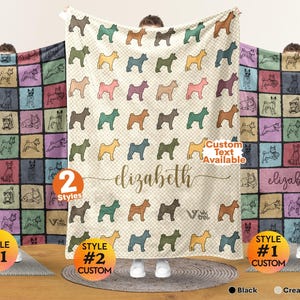 May include: A soft fleece blanket featuring a repeating pattern of dog silhouettes in various colors. The center design displays the name elizabeth in cursive script, with the text Custom Text Available and the brand logo vtrek printed on the fabric.