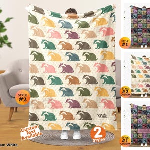 May include: A cream white throw blanket featuring a repeating pattern of stylized badgers in various colors including blue, green, yellow, pink, and brown. The blanket displays the text Viv Trek and offers custom text options in different styles.