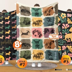 May include: Three rectangular blankets featuring dachshund designs. The left blanket is black with colorful dog silhouettes and the name Elizabeth. The center blanket has a grid of dachshund illustrations on a cream background. The right blanket is black with floral patterns and a large yellow dachshund silhouette with the name Elizabeth.