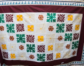 Hand-sewn colorful patchwork blanket in boho style