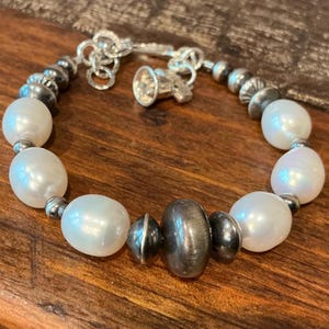 B555D - Pearl Bracelet, Sterling Navajo Pearls and Saucers and Liberty Bell Charm