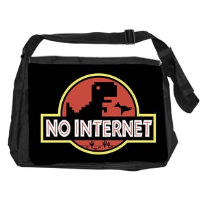 May include: Black messenger bag with a red and yellow graphic that reads "NO INTERNET". The graphic features a pixelated dinosaur silhouette and a desert landscape. The bag has a black adjustable strap.