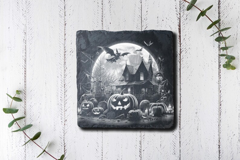 May include: Black and white illustration of a spooky house with a full moon and jack-o'-lanterns in front of it. The house has a pointed roof and windows with glowing lights. The jack-o'-lanterns have carved faces and are surrounded by cobwebs.