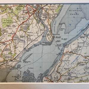 May include: A vintage map of the Chepstow area in Wales, UK. The map shows the Severn River, the town of Chepstow, and surrounding villages. The map is printed in black, blue, and green ink on a white background.