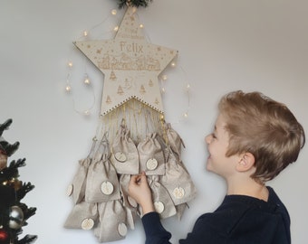 Personalized wooden advent calendar – star-shaped with name – optional number chips and bags – Christmas decoration for children