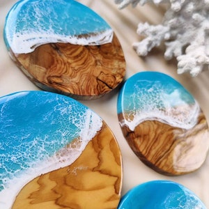 Set of coasters for drinking glasses made of olive wood decorated with resin sea waves, for unusual table decorations, unique gift