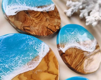 Set of coasters for drinking glasses made of olive wood decorated with resin sea waves, for unusual table decorations, unique gift