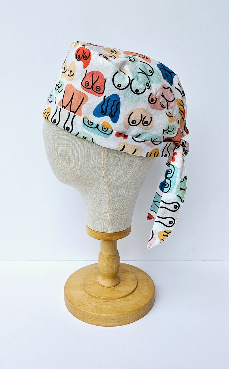 Modern Boob Print Surgical Scrub Hat, Colourful Rainbow Boobs Scrub Cap, Pull On Euro Style, Adjustable Tie Back Pixie Style. image 7