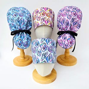 Chirurgische scrubmuts met levendige vulva-print: pixie-, euro- en europony-stijlen