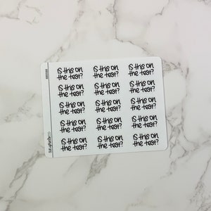 May include: A sheet of 18 white stickers with black text that reads "Is this on the test?"  These stickers are great for students to use in their notebooks or planners.