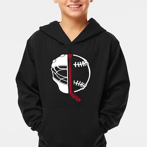 May include: Black hoodie with a white and red graphic. The design is a split image of a hockey goalie mask and a baseball, with a red hockey stick bisecting them. The hoodie has a front pocket and a hood.