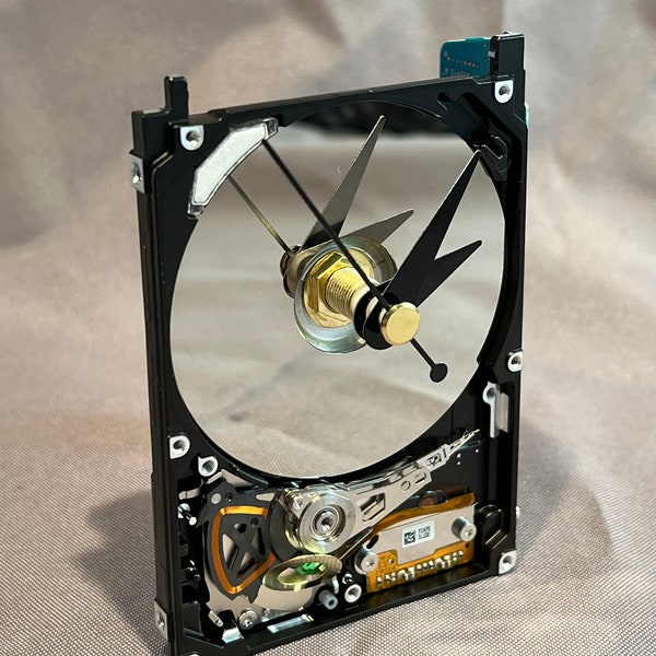 Recycled laptop computer hard drive desk clock. An eco-friendly, unique cool gift for computer enthusiast, IT professional or gamer