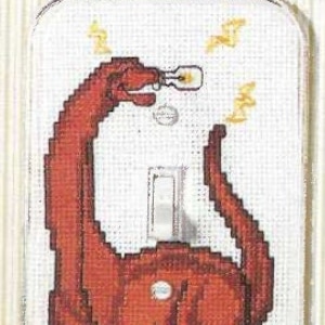 May include: A red dinosaur with a long neck is holding a light bulb. The dinosaur is standing in front of a light switch. The light switch is white and has a black toggle.