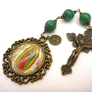Three Hail Mary Chaplet, 10mm green dyed quartz, 2mm gold hematite, caps, spacers. Ornated medallion, Vatican crucifix, St Benedict charm