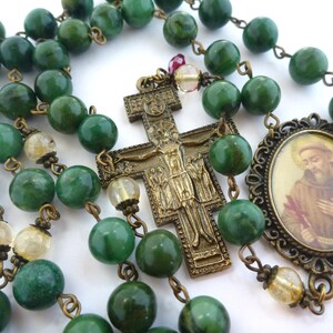 Rosary Saint Francis, 8mm green agate, 6mm citrine. Caps, spacers. Red glass bead. Scalloped medallion. St. Damiano crucifix.