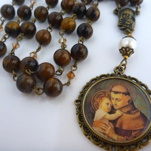 Chaplet of Saint Anthony, 8mm Tiger Eye, 4mm crystals. 10mm button pearl, filigree caps. MIRACULOUS MEDAL connector. Medallion