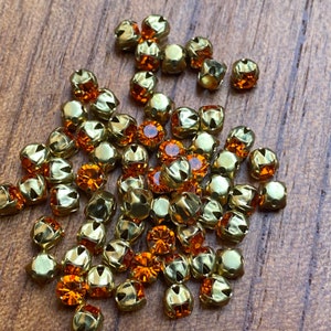 4mm Chatons Montees, Preciosa MC Chaton Maxima SS16/PP31 Crystal Sun with Gold cross setting, for beading, sewing, embroidery