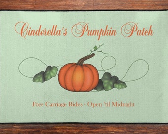 Hand-drawn Pumpkin with Vines and Leaves illustrates "Cinderella's Pumpkin Patch" on this Indoor/Outdoor Floor Mat
