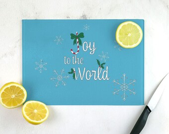 Christmas Holly, Candy Cane and Snowflake design "Joy to the World" tempered glass cutting board