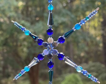 Beaded snowflake ornament/sun catcher blue tone 6 inches