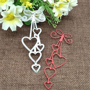 Fustelle in metallo a forma di cuore con fiocco, stencil per lavori di carta, per fai da te, scrapbooking, foto, decorazioni per biglietti