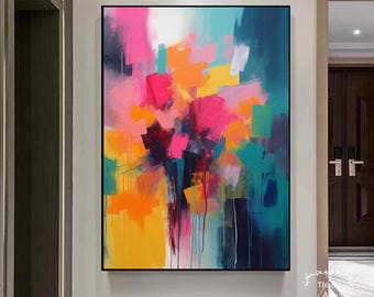 May include: Abstract art painting in a black frame. The artwork features a vibrant mix of colours, including pink, orange, yellow, teal, and dark blue. The brushstrokes create a dynamic and textured composition, suitable for home decor.